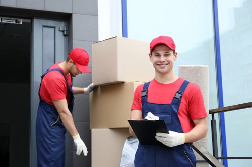 Local furniture pick-up service loading office furniture in Surrey