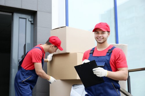 Local removals crew handling furniture transport in Surrey