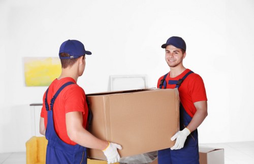 Staff wearing PPE during a removal job