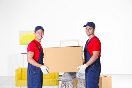 Professional removals team loading household items in Surrey