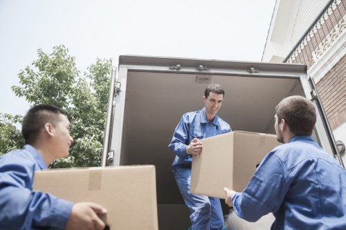 Moving truck and crew handling a residential move in Surrey
