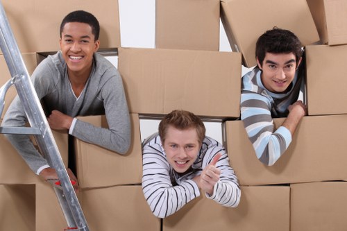 Office relocation vehicle loading business furniture and archive boxes