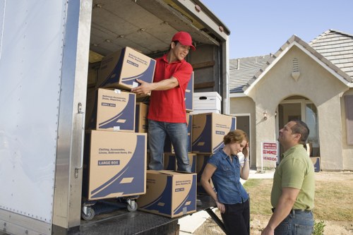 Loading commercial boxes and office items for transport in Surrey