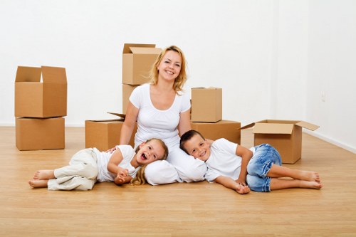 Stacked packing boxes and moving materials for Surrey customers