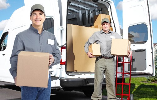 Labelled office boxes and workstations prepared for an organised move