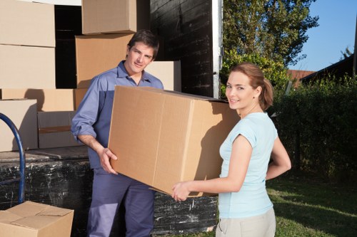 Emergency-ready moving team near a vehicle